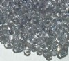 25 grams of 3x7mm Grey Lined Crystal Farfalle Seed Beads